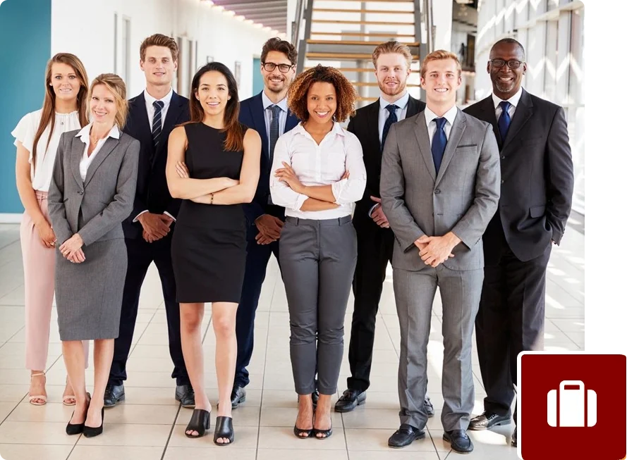 A group of people in business attire standing together.