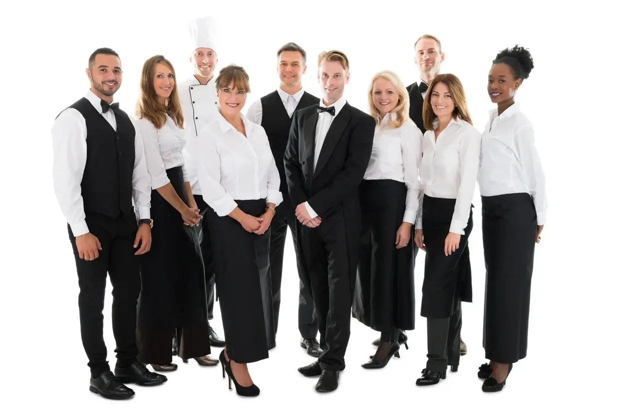 A group of people in black and white attire.